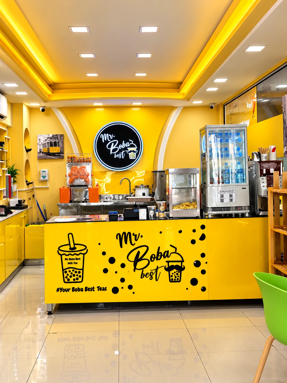 Bright, people-free Mr. Boba Best milk tea shop interior with yellow branded counter and illuminated logo